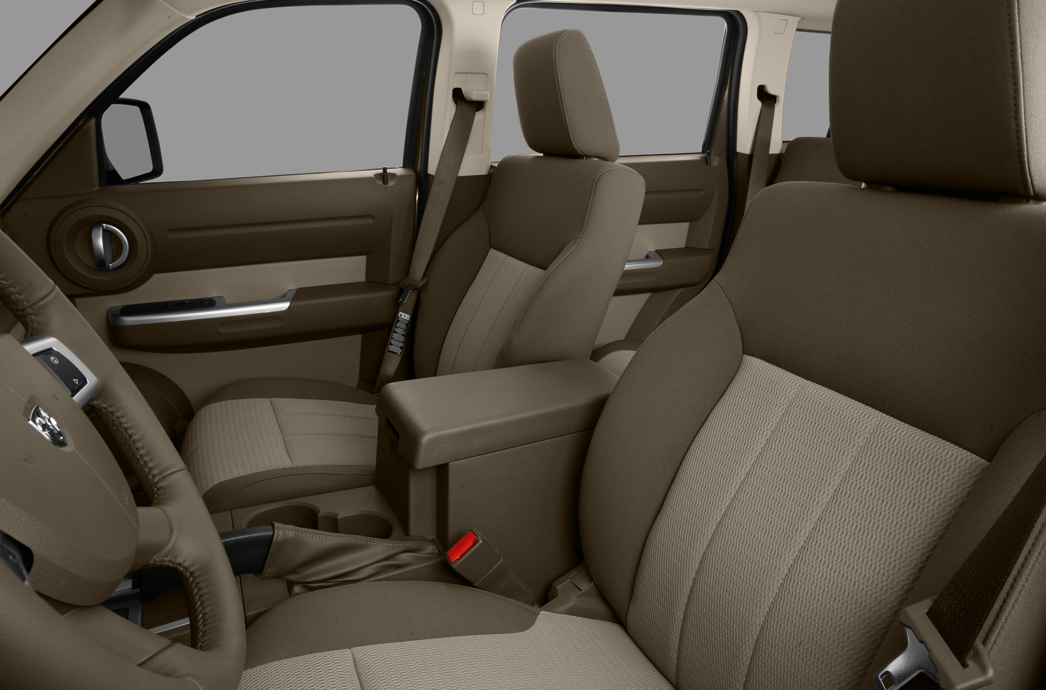 Fabric front seats with center armrest and detailed door panel