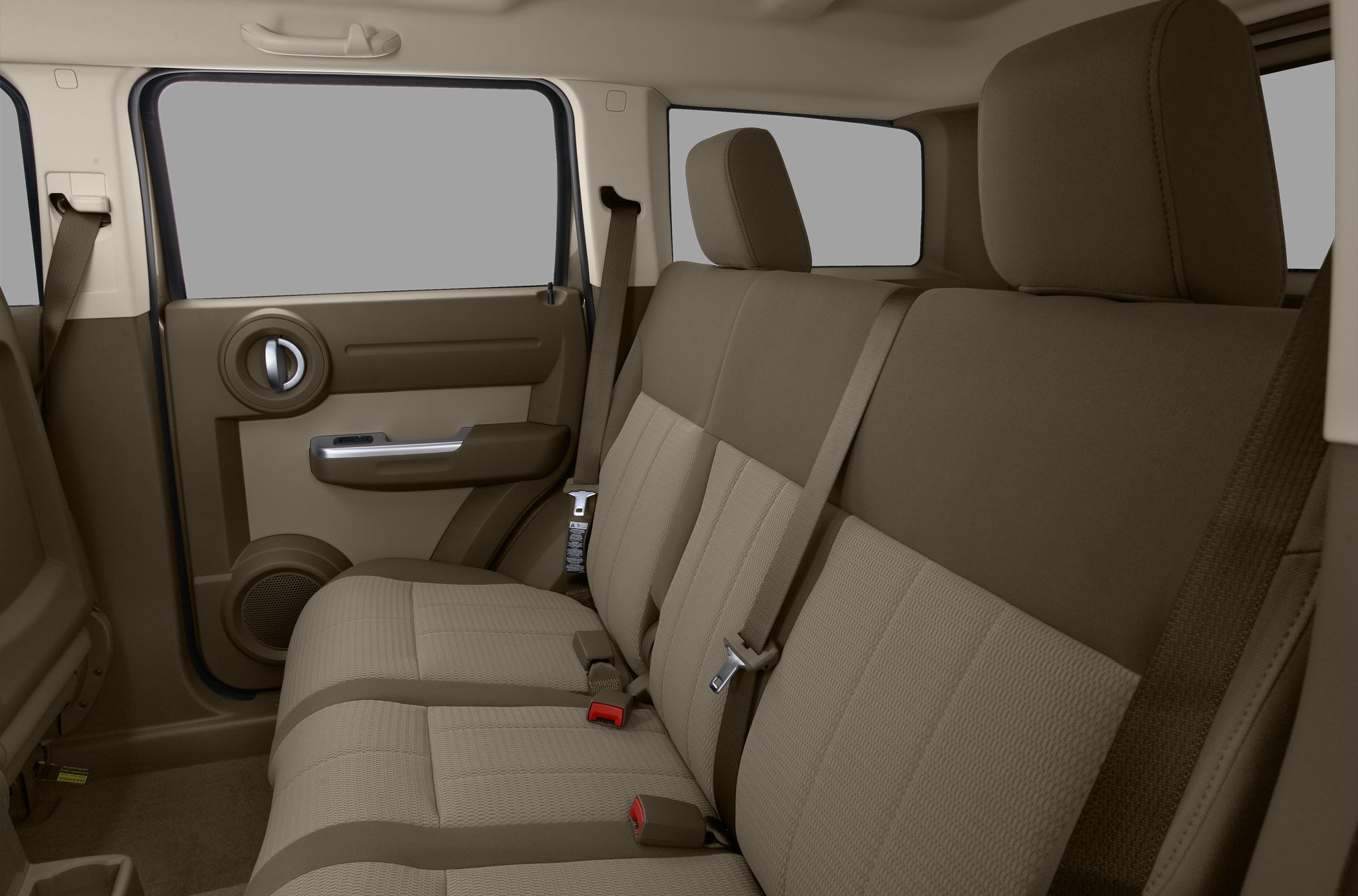 Rear seat interior with fabric upholstery and seat belts
