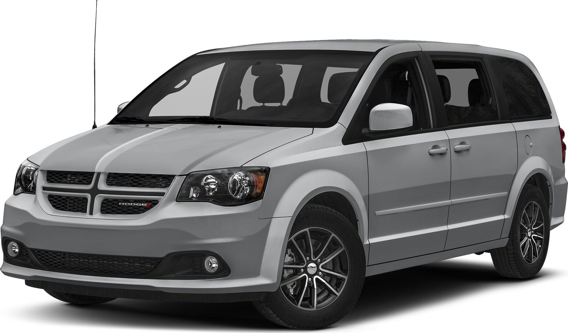 Minivan front side view with distinctive headlights and alloy wheels