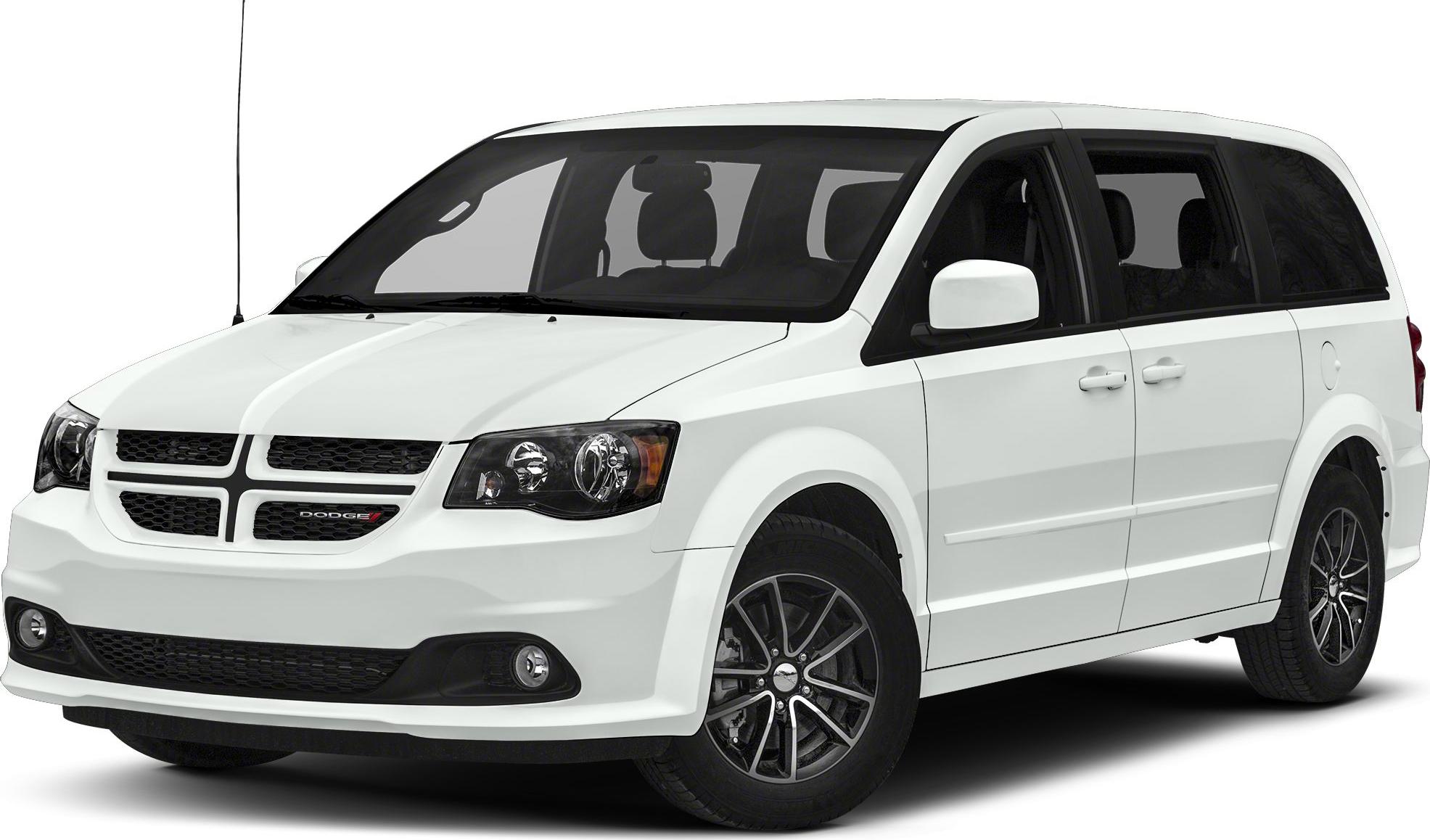 White minivan front angled view with headlights and alloy wheels