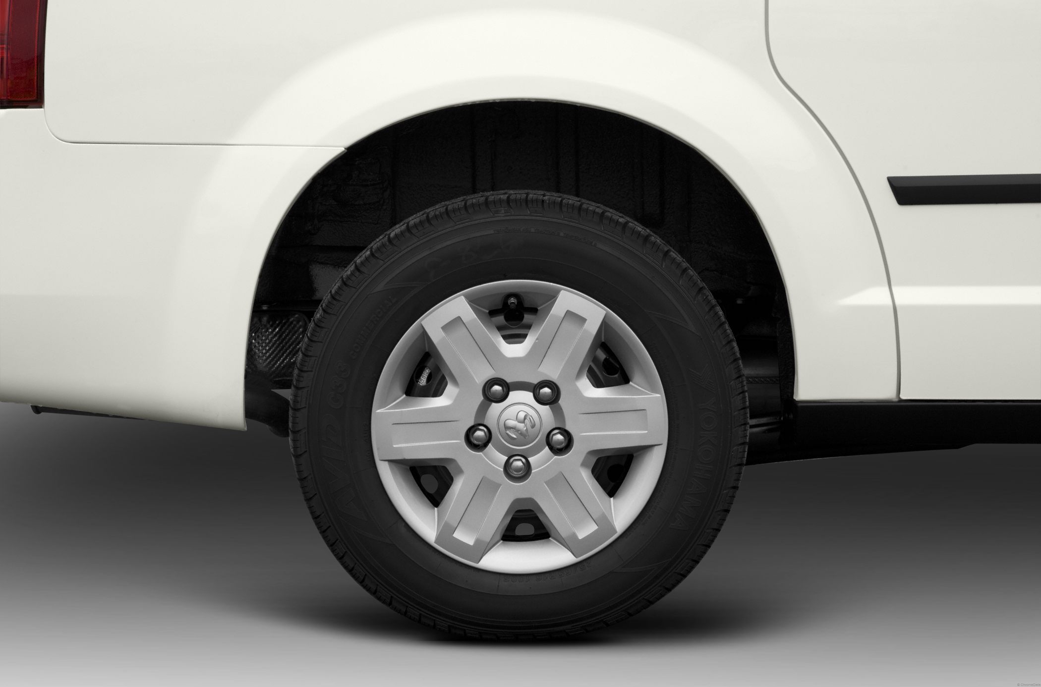 Close-up of alloy wheel with tire on vehicle side