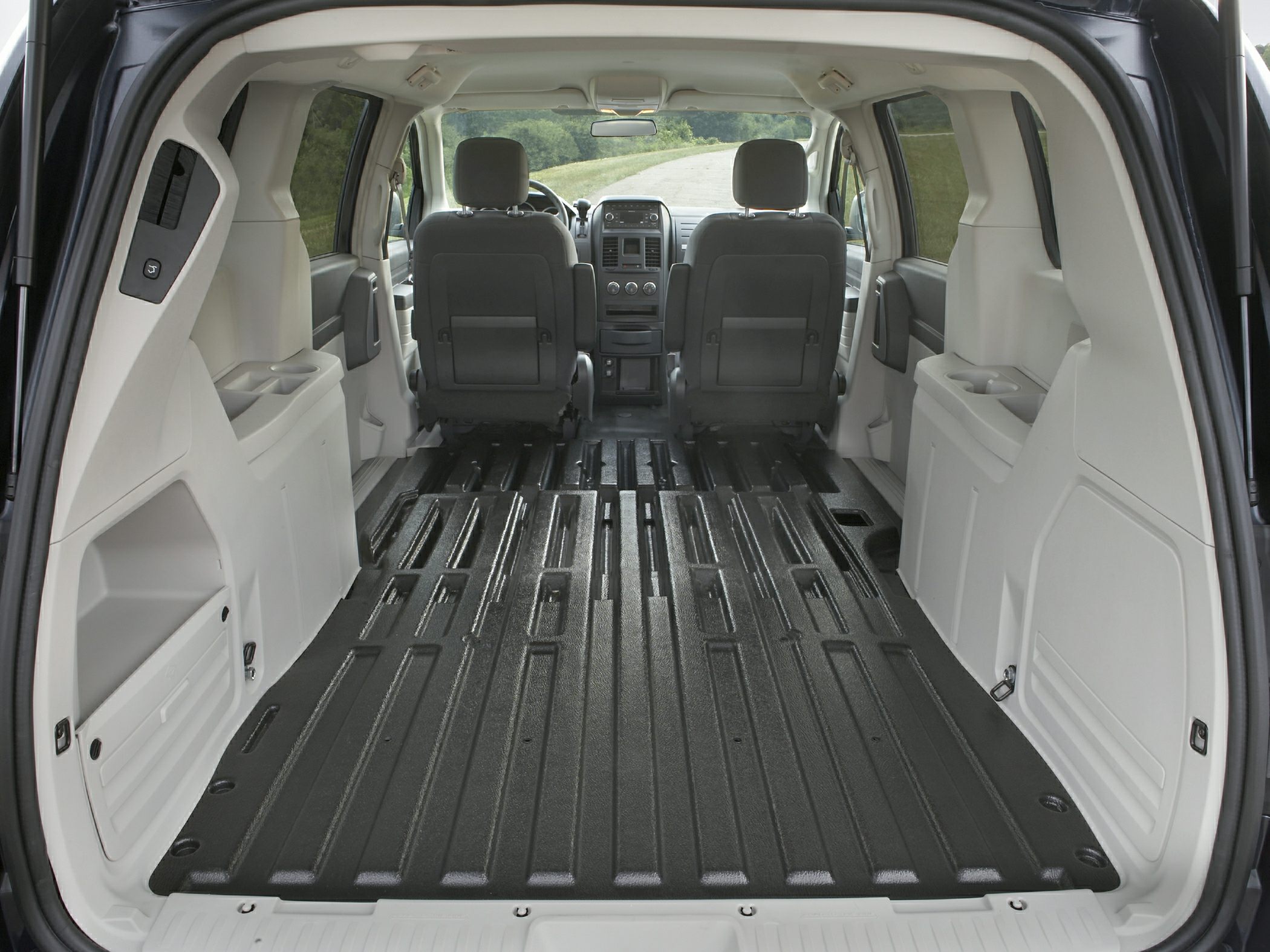 Large flat cargo area and spacious storage inside minivan interior