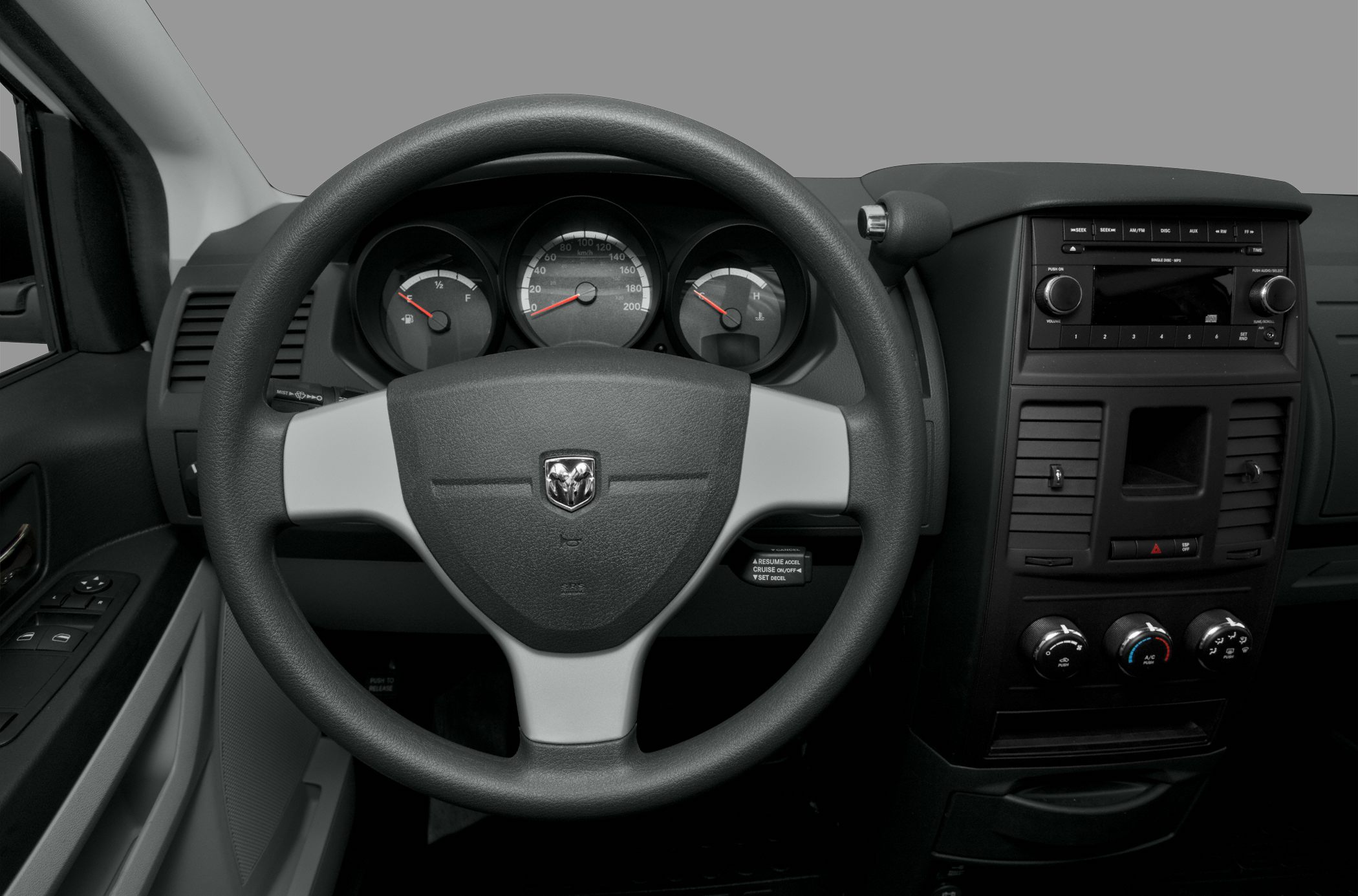 Steering wheel with instrument cluster and dashboard controls