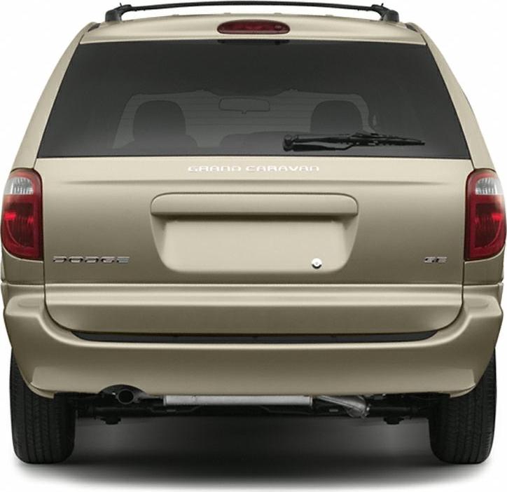 Rear view of a minivan with tinted window and roof rack