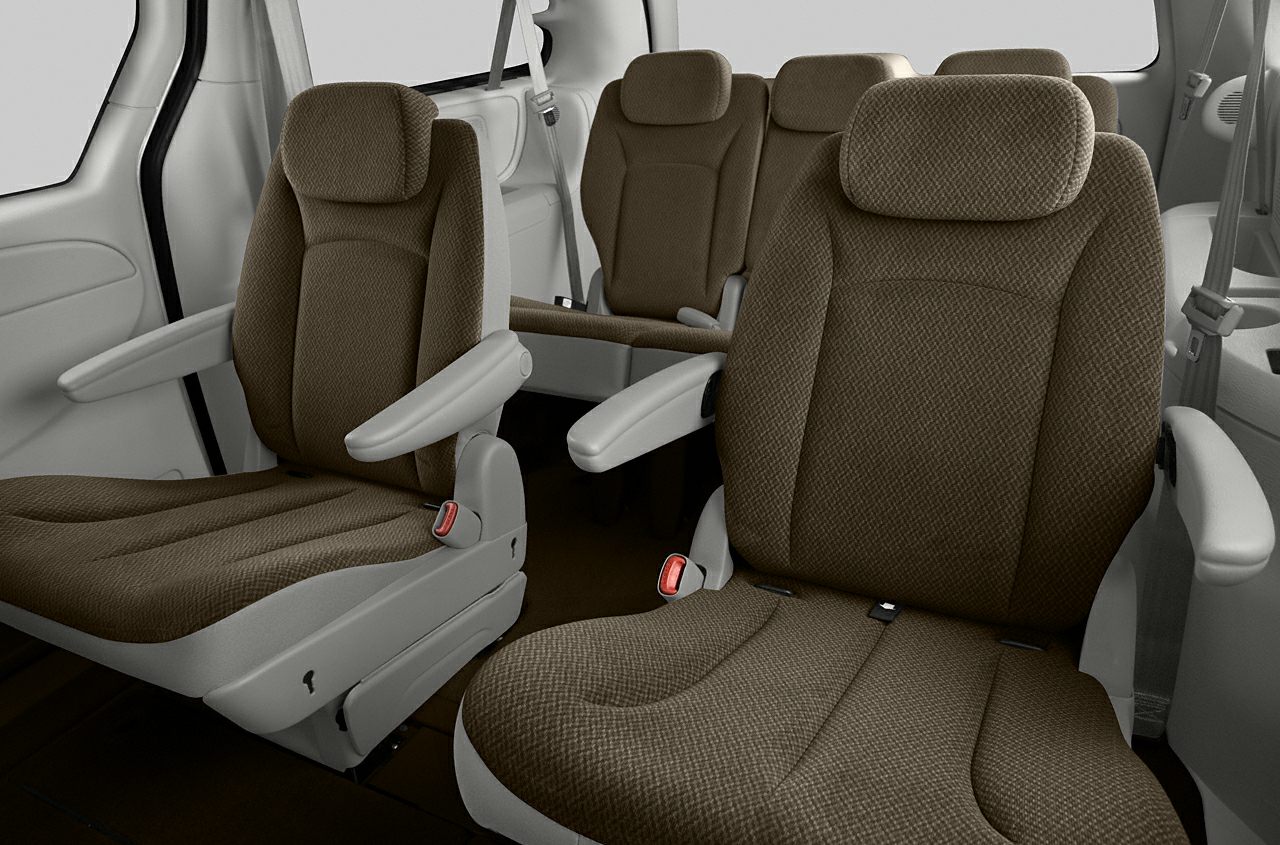 Minivan interior fabric seats with three-row layout and armrests