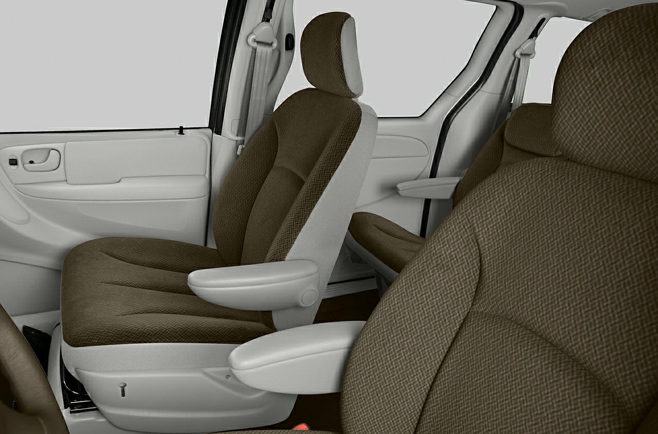 Fabric front seats with armrests and car door panel interior