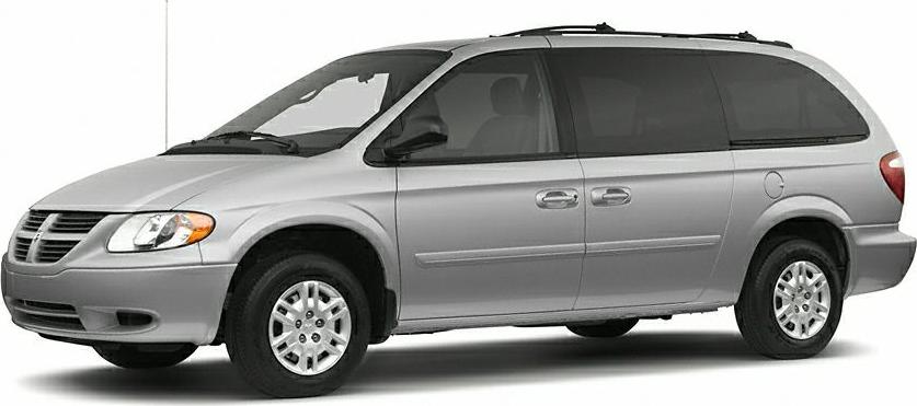 Silver minivan side view with sliding doors and alloy wheels