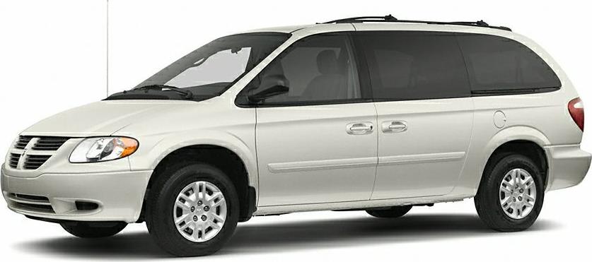White minivan side profile with sliding doors and alloy wheels