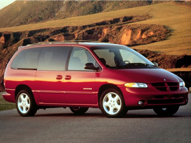 Red minivan with dual sliding doors and smooth design