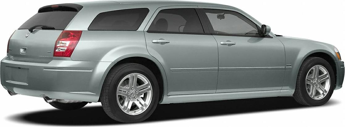 Rear side view of a silver station wagon with distinctive rear lights and alloy wheels.