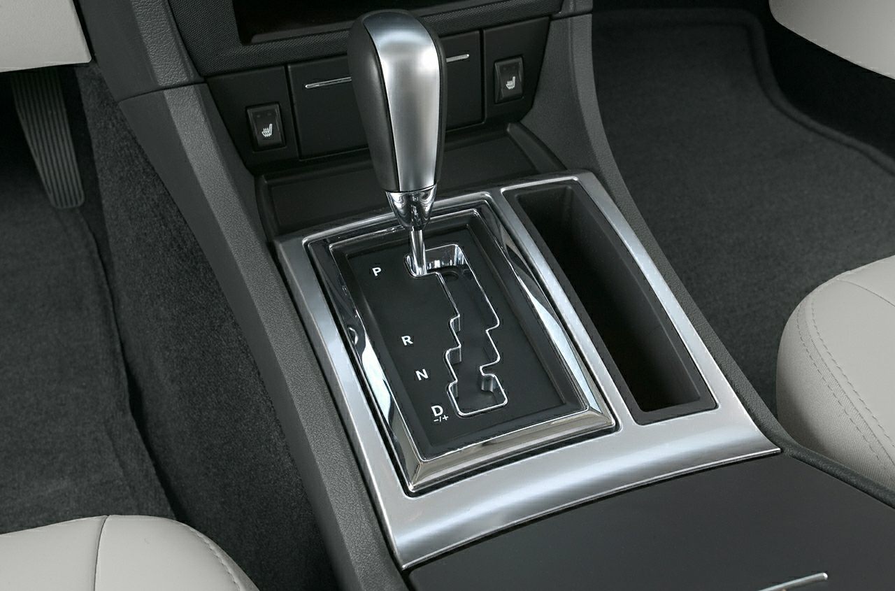 Automatic gear shift lever and center console with chrome trim