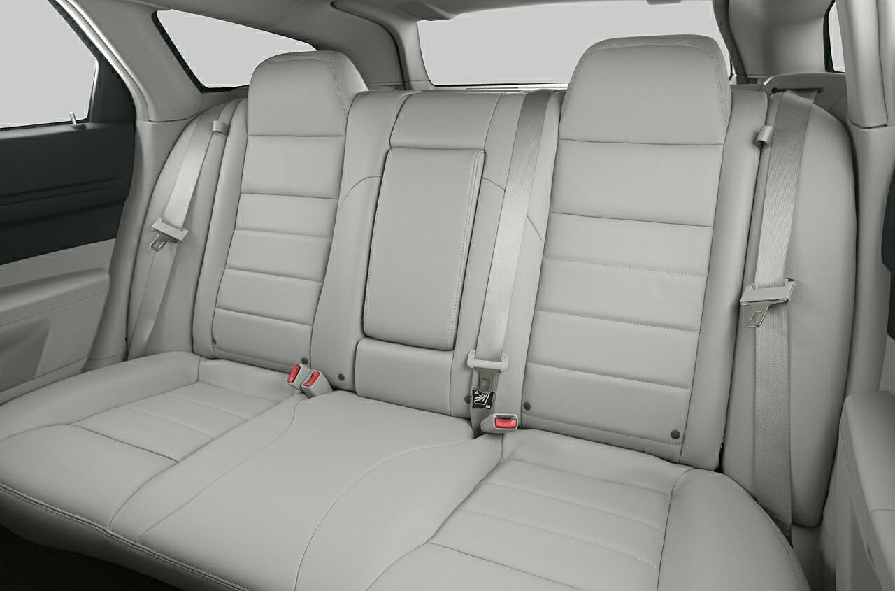 Leather rear seats with integrated seatbelts and headrests