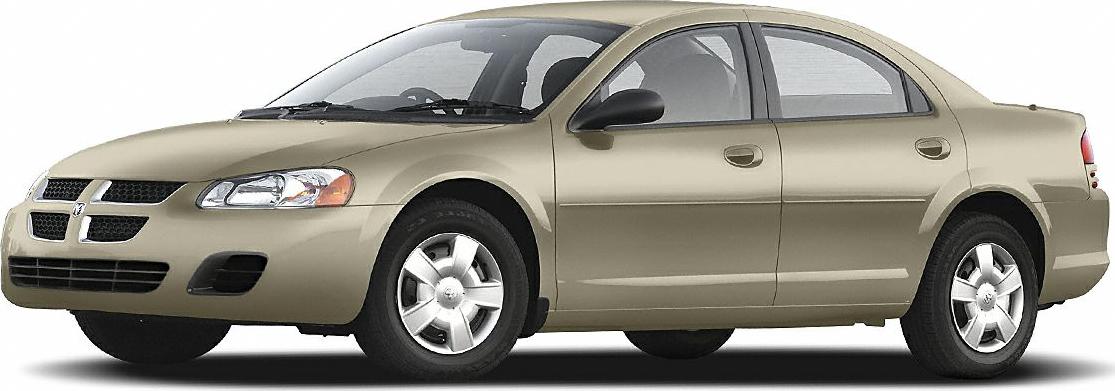 Four-door mid-size sedan with alloy wheels and beige body