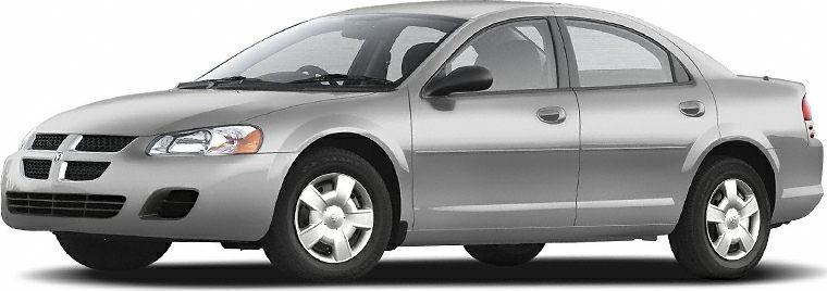Front side view of a silver sedan with aerodynamic design and alloy wheels