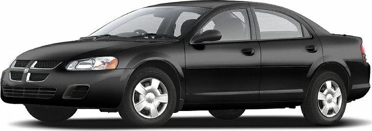 Black four-door sedan side profile with smooth design lines