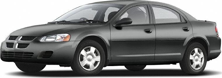 Sleek side profile of a four-door sedan with aerodynamic design and alloy wheels