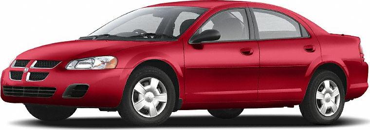 Red sedan showing front side profile with visible wheels