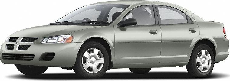 Side profile of a four-door sedan with alloy wheels