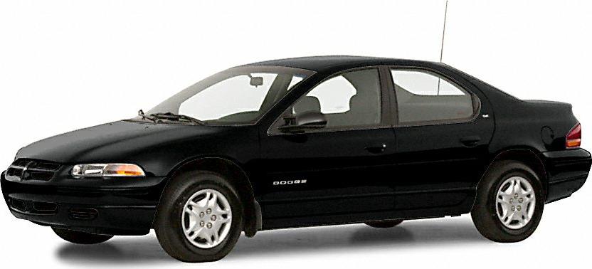 Front side view of a black four-door sedan with smooth body lines and alloy wheels.