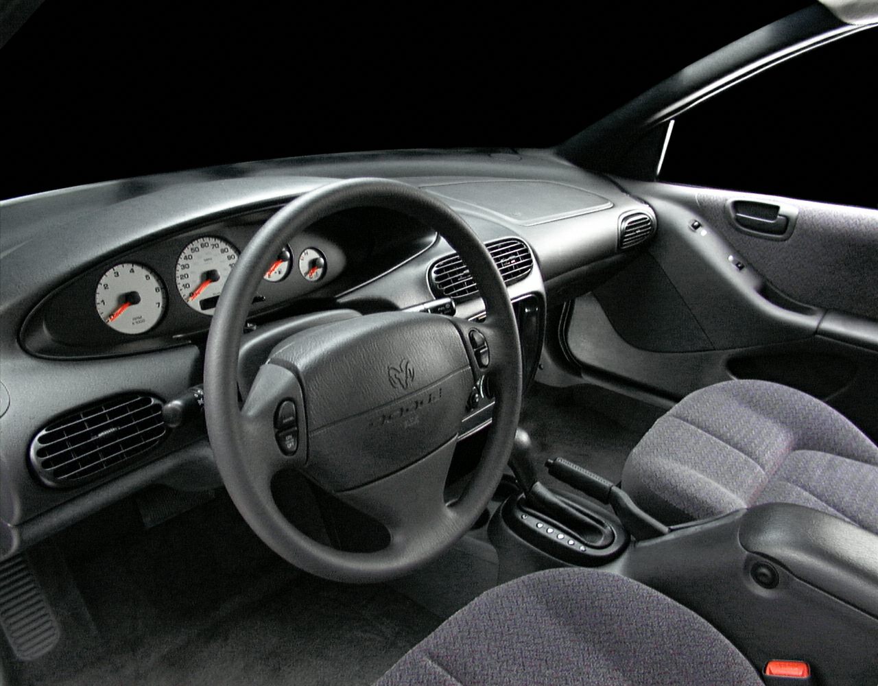 Dashboard with instruments and steering wheel including automatic transmission controls