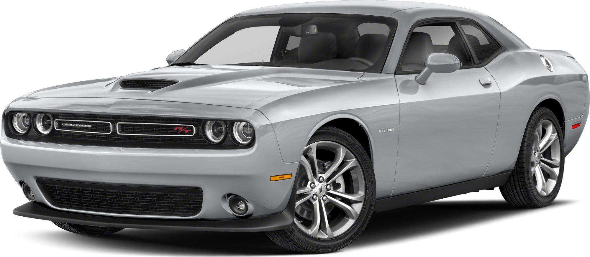 Dual headlights and aggressive hood scoop on muscle coupe front side view