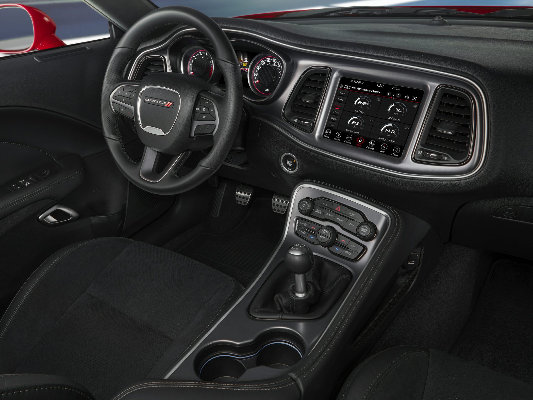 Manual transmission interior with digital instruments and infotainment display