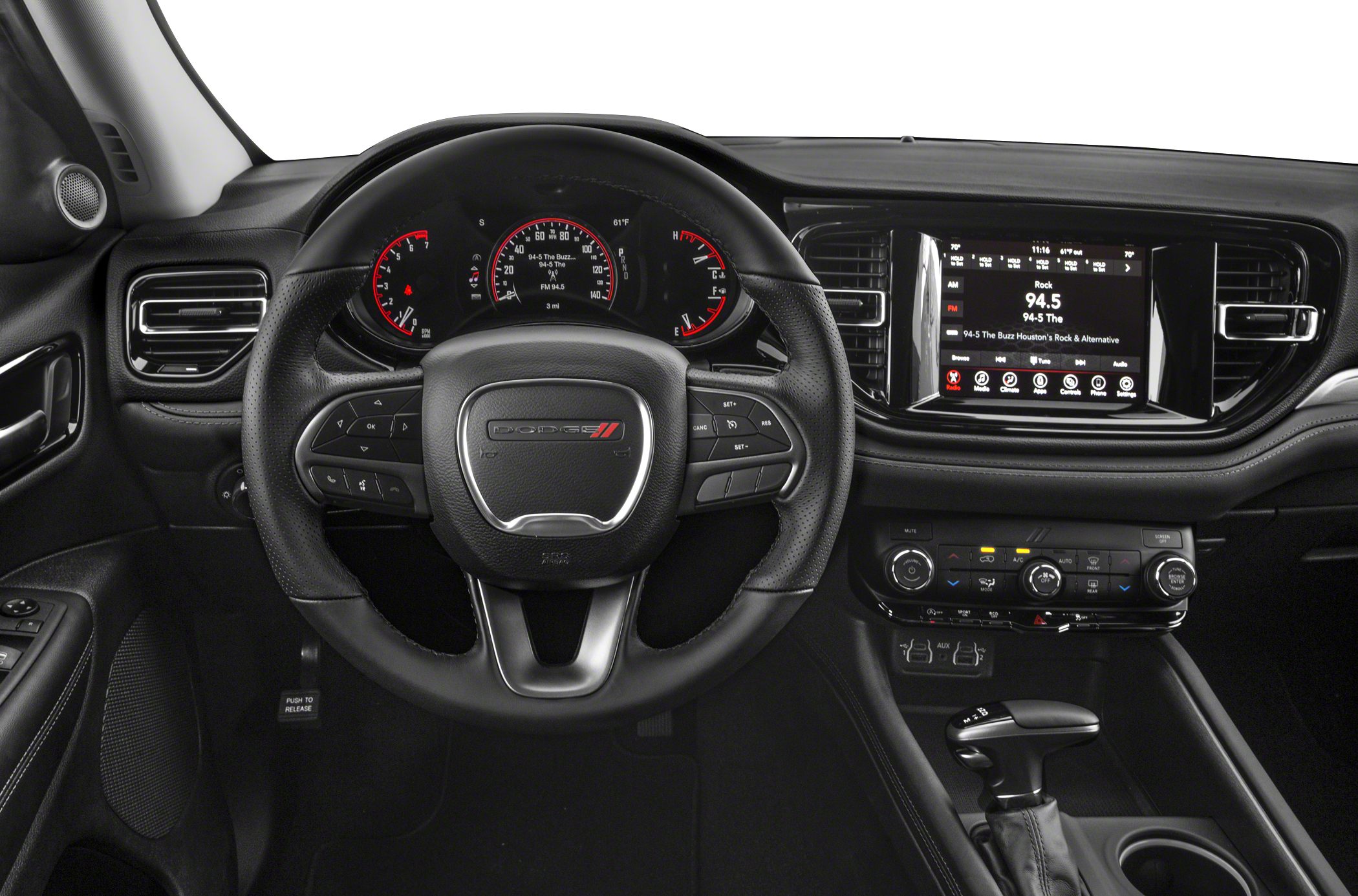 Steering wheel with controls and digital gauge cluster with infotainment screen