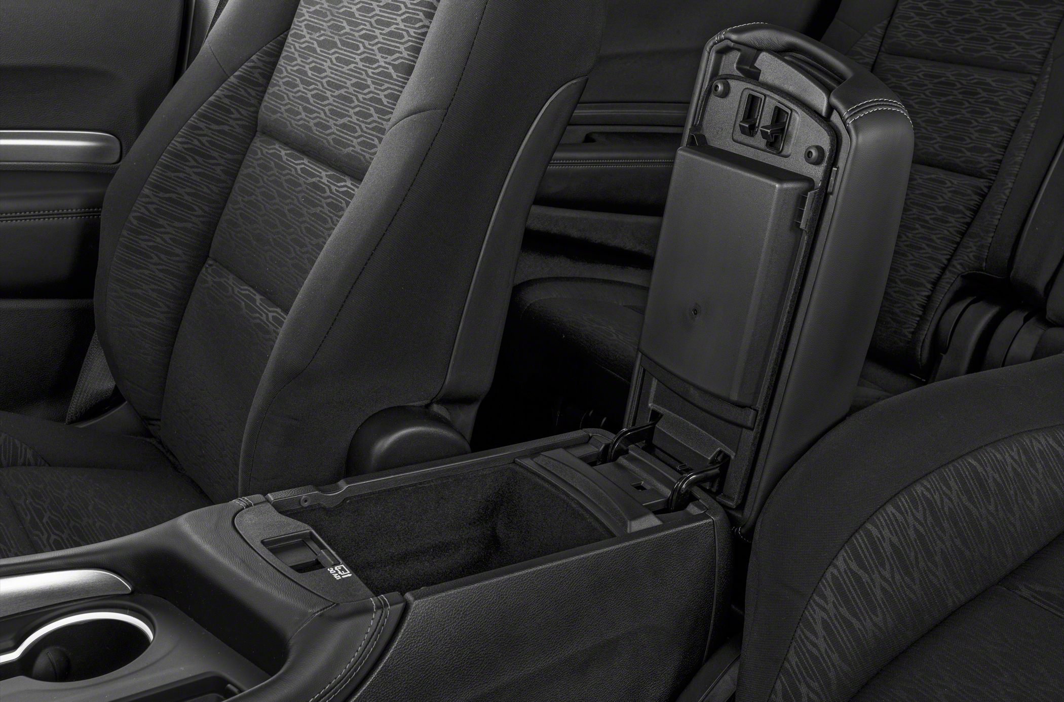 Center console storage with armrest in black fabric interior