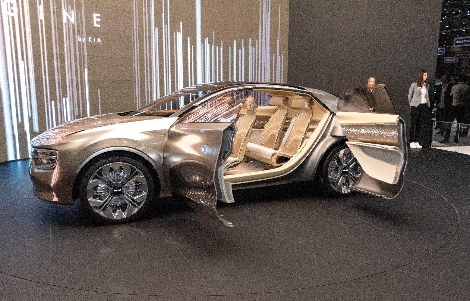 Sleek electric concept with rear-hinged doors and beige luxury seats