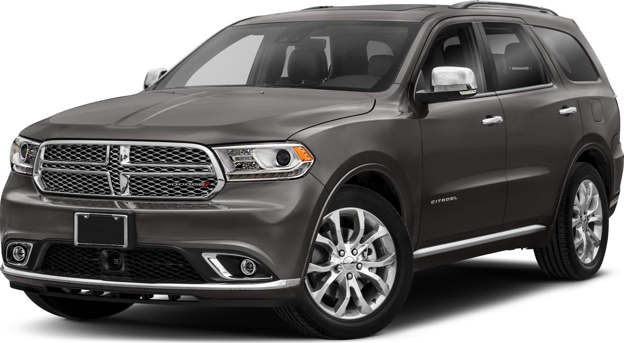 Front and side view of SUV with chrome mesh grille and alloy wheels