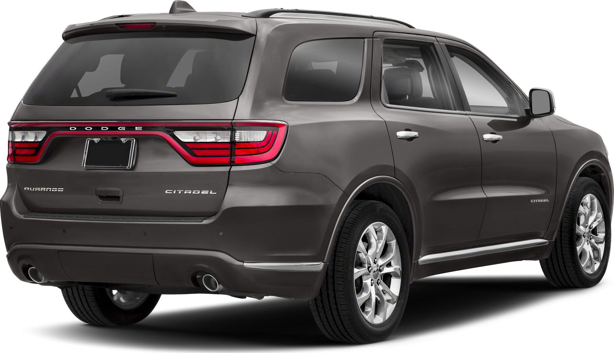 Rear side view with LED taillights and dual exhaust pipes on a modern SUV