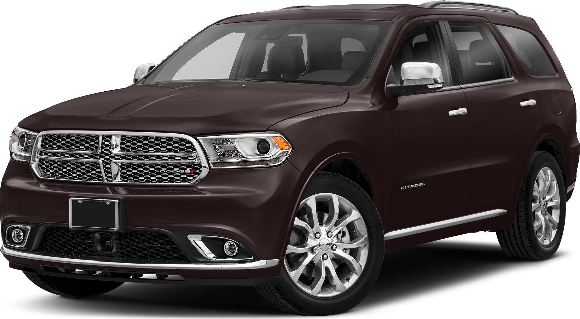 Front side profile with chrome grille, modern headlights, and alloy rims