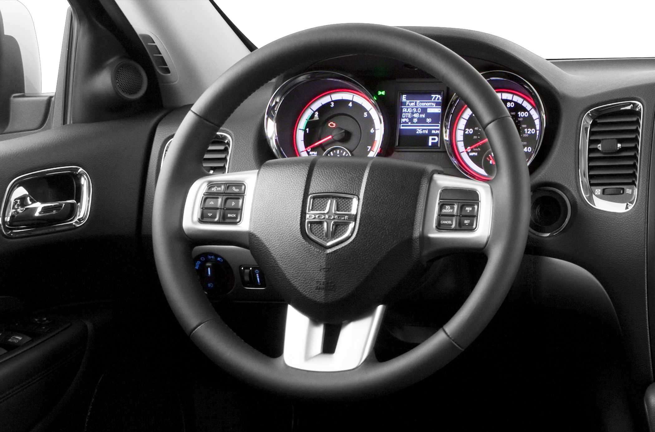 Steering wheel with control buttons and dashboard instrument cluster