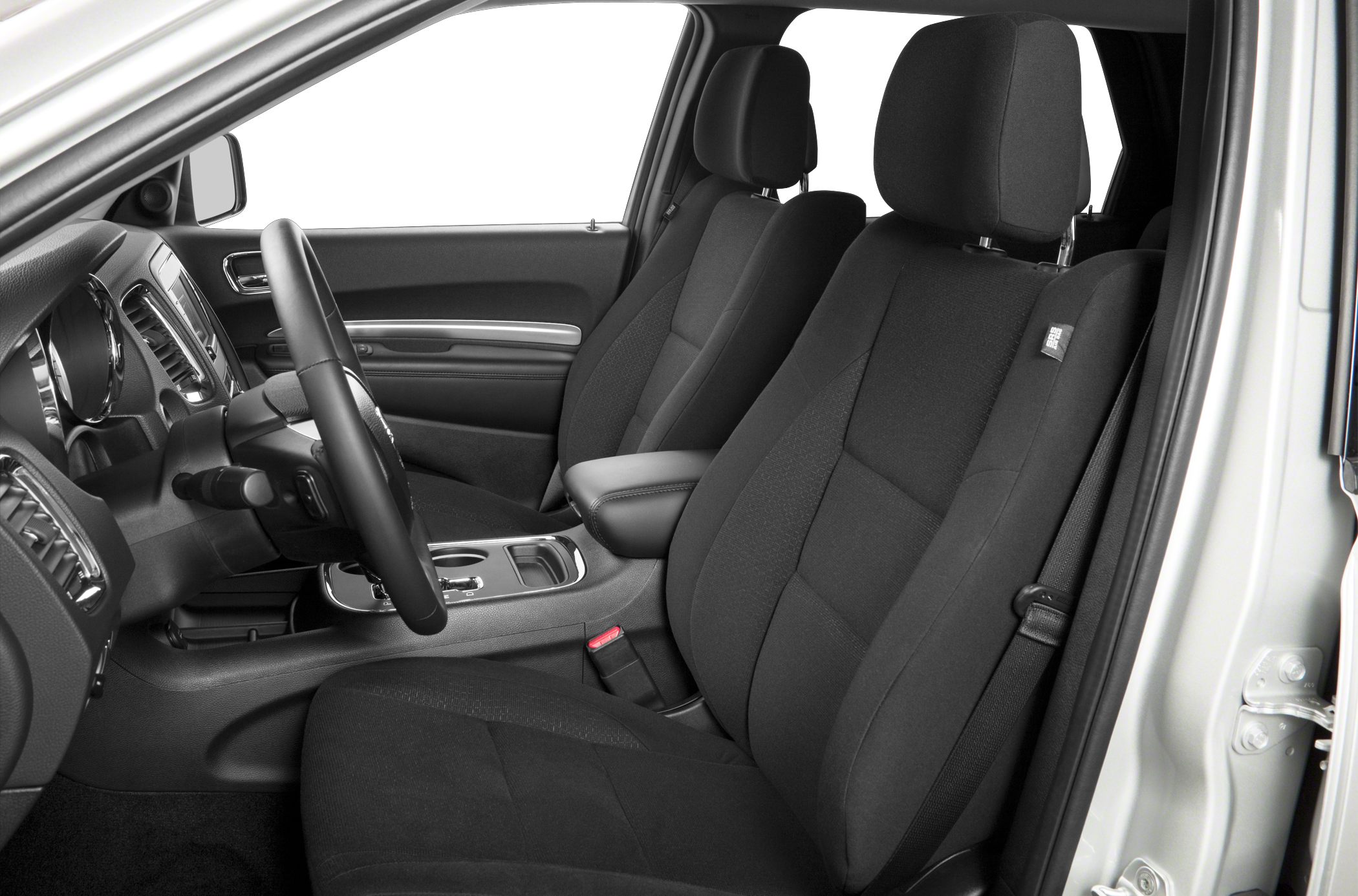 Front seats, steering wheel, and dashboard interior view
