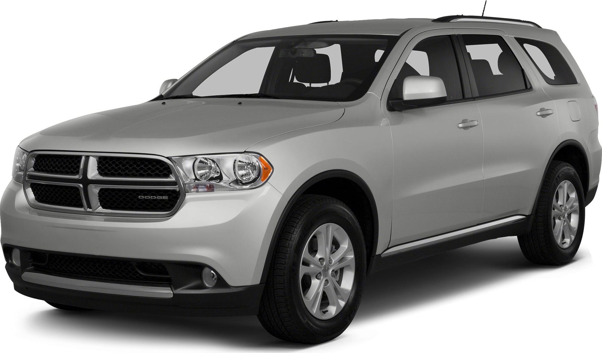 Silver SUV with chrome grille, roof rails, and alloy wheels