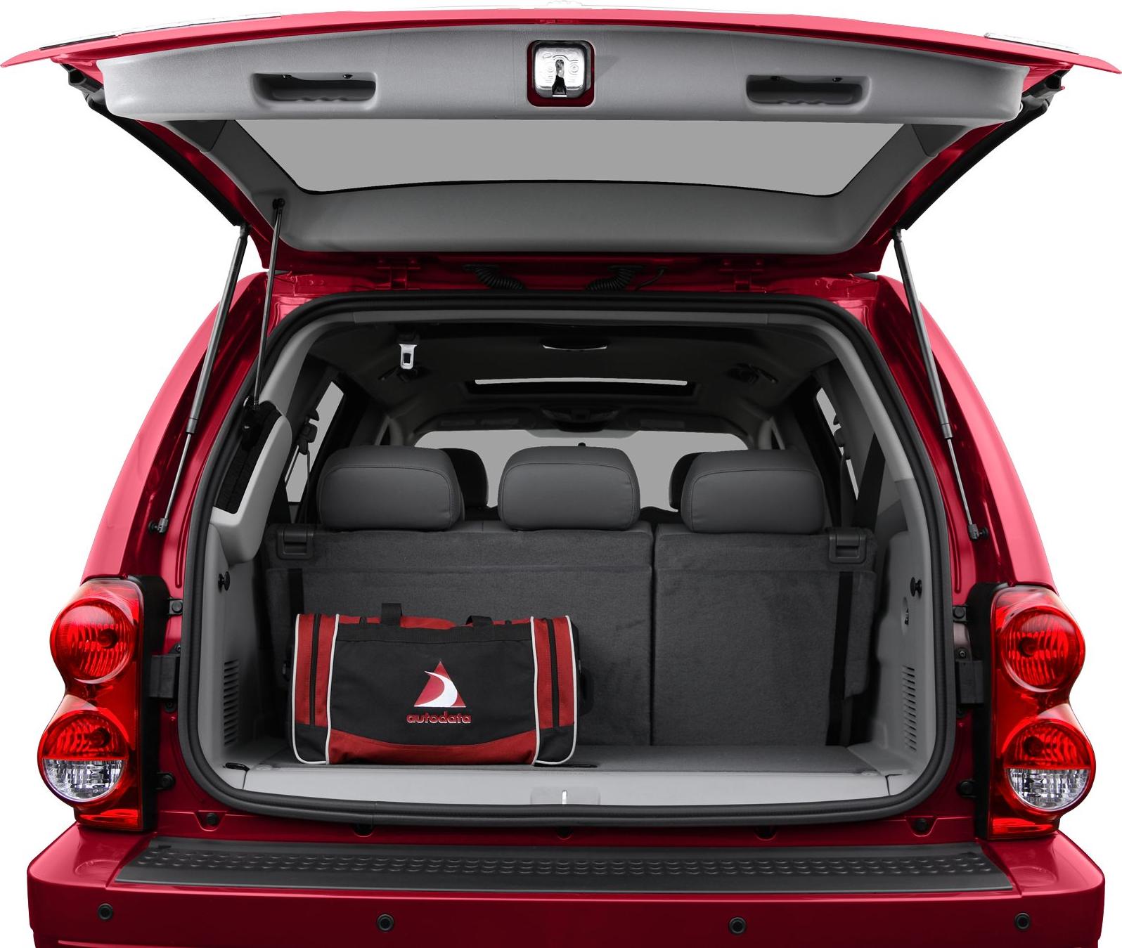 SUV rear cargo space with open tailgate and red rear lights