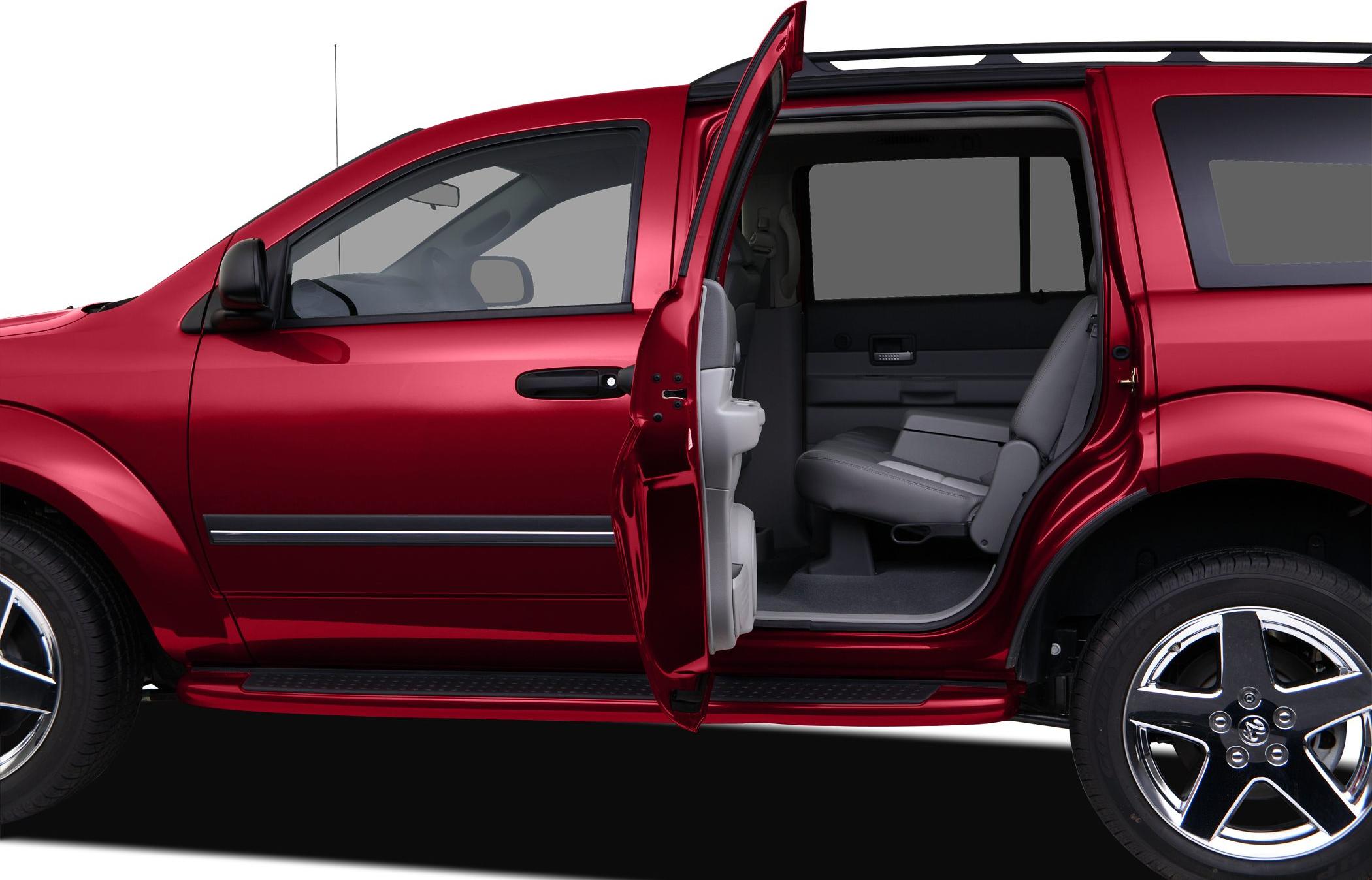 Side view with open rear door and visible gray interior seats