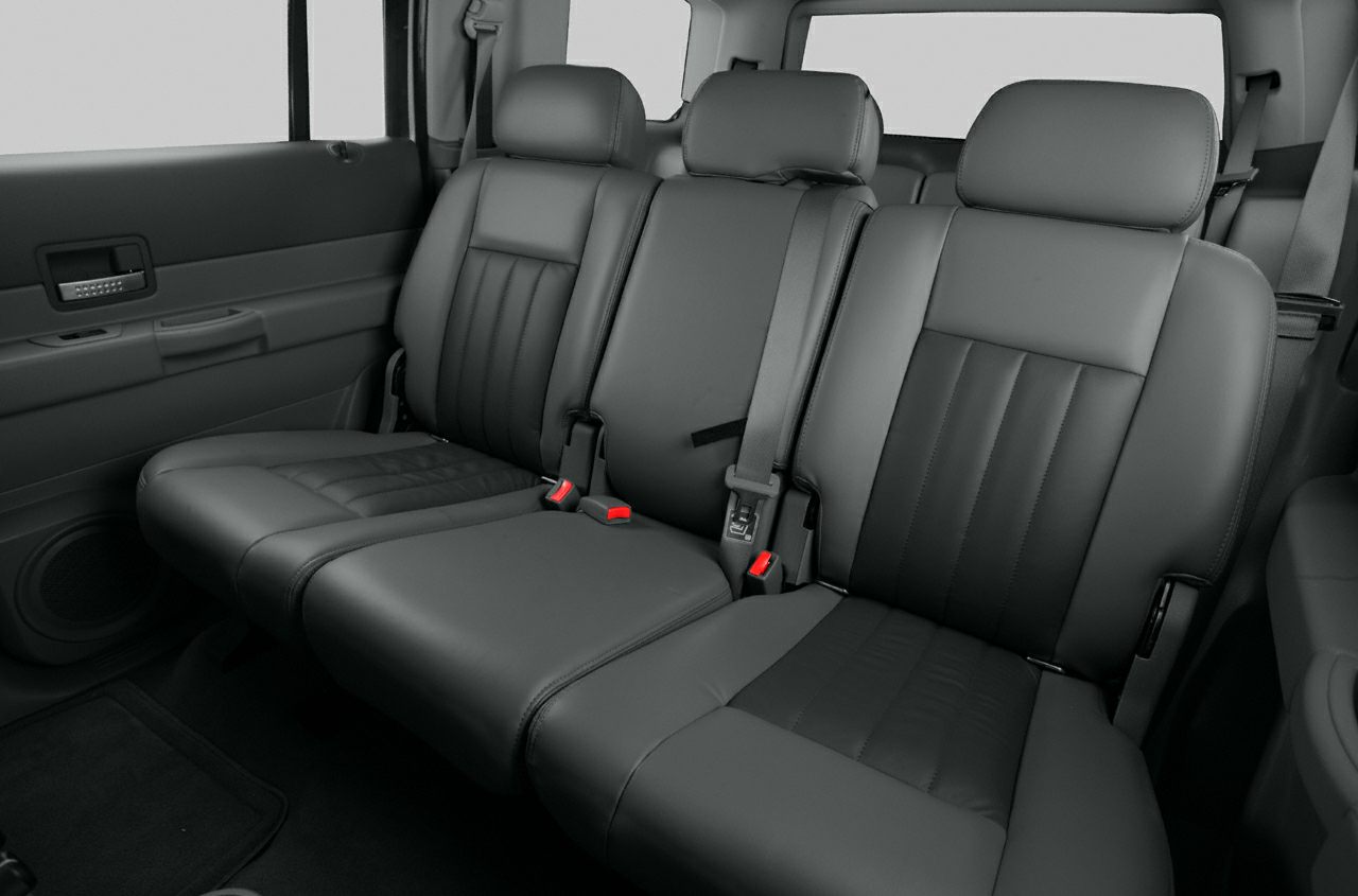 Rear leather seats with headrests and detailed stitching