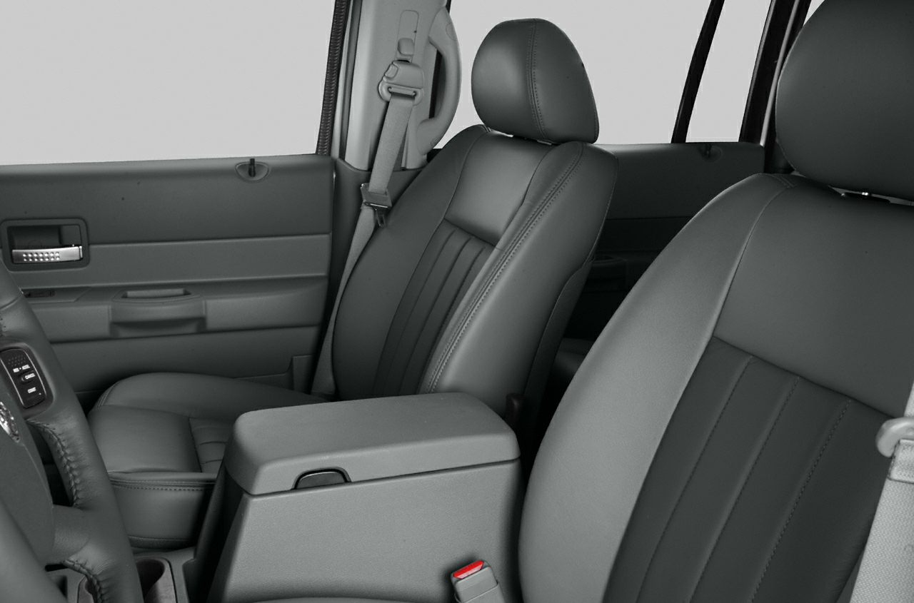Front seats with leather upholstery and door panel interior