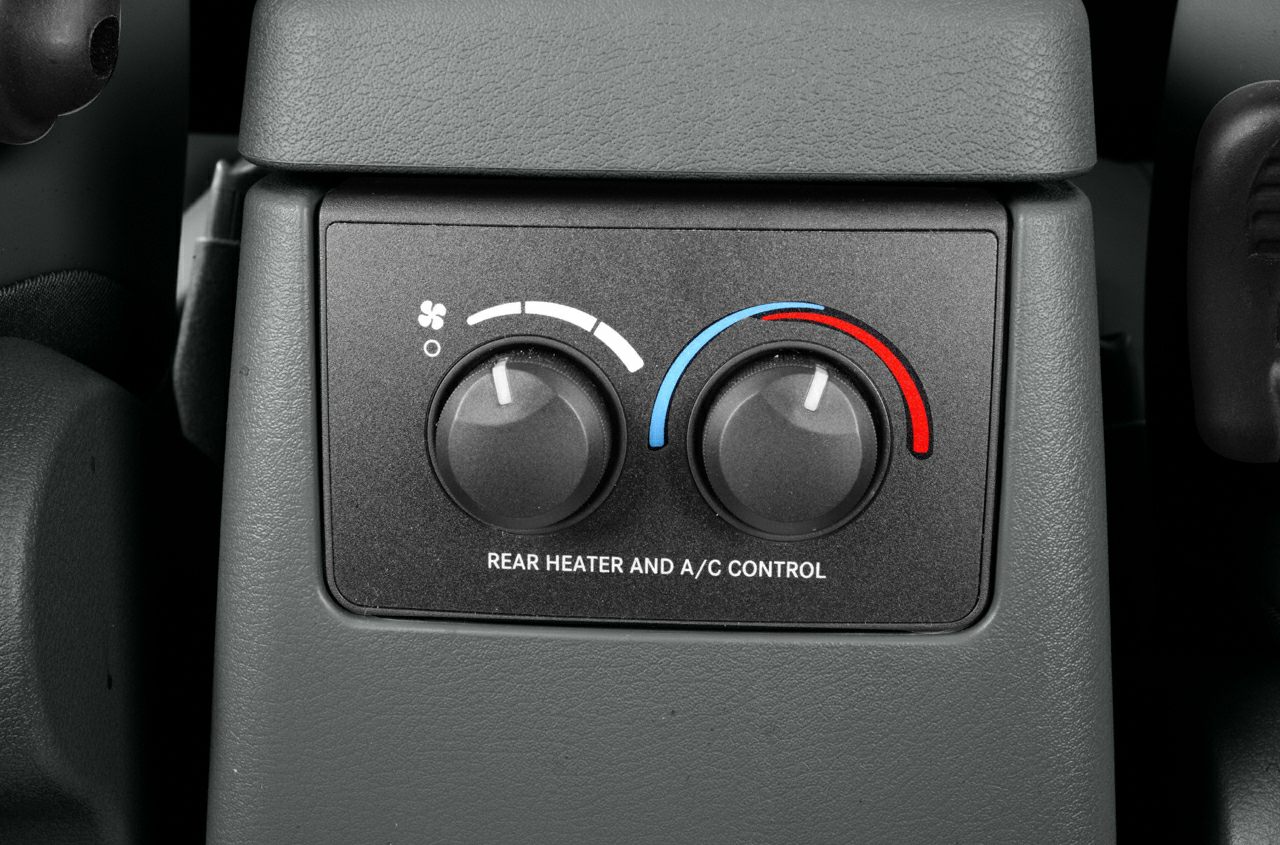 Rear heater and A/C control knobs with fan speed and temperature adjustment