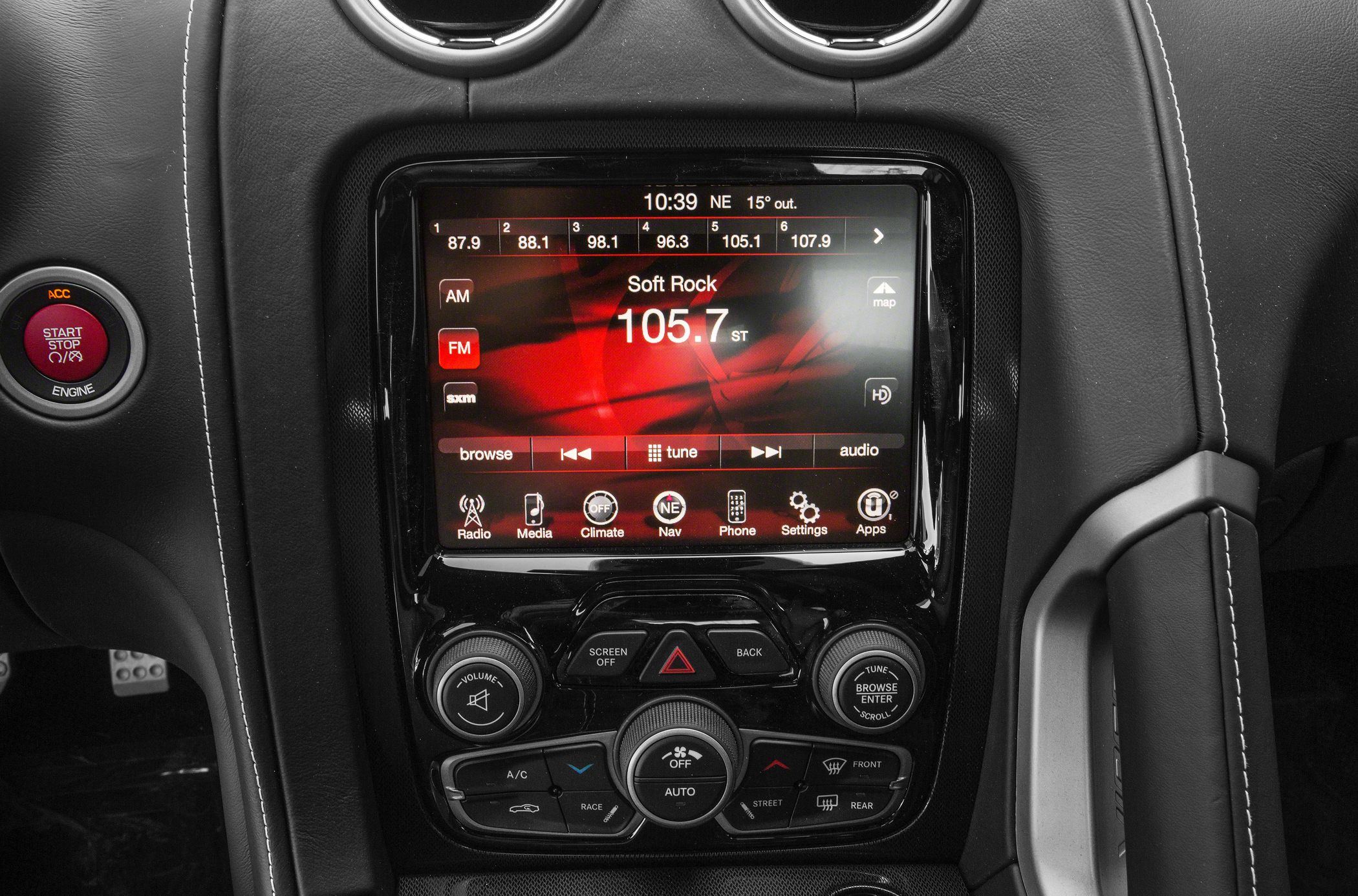 Infotainment touchscreen and control panel with climate and audio controls