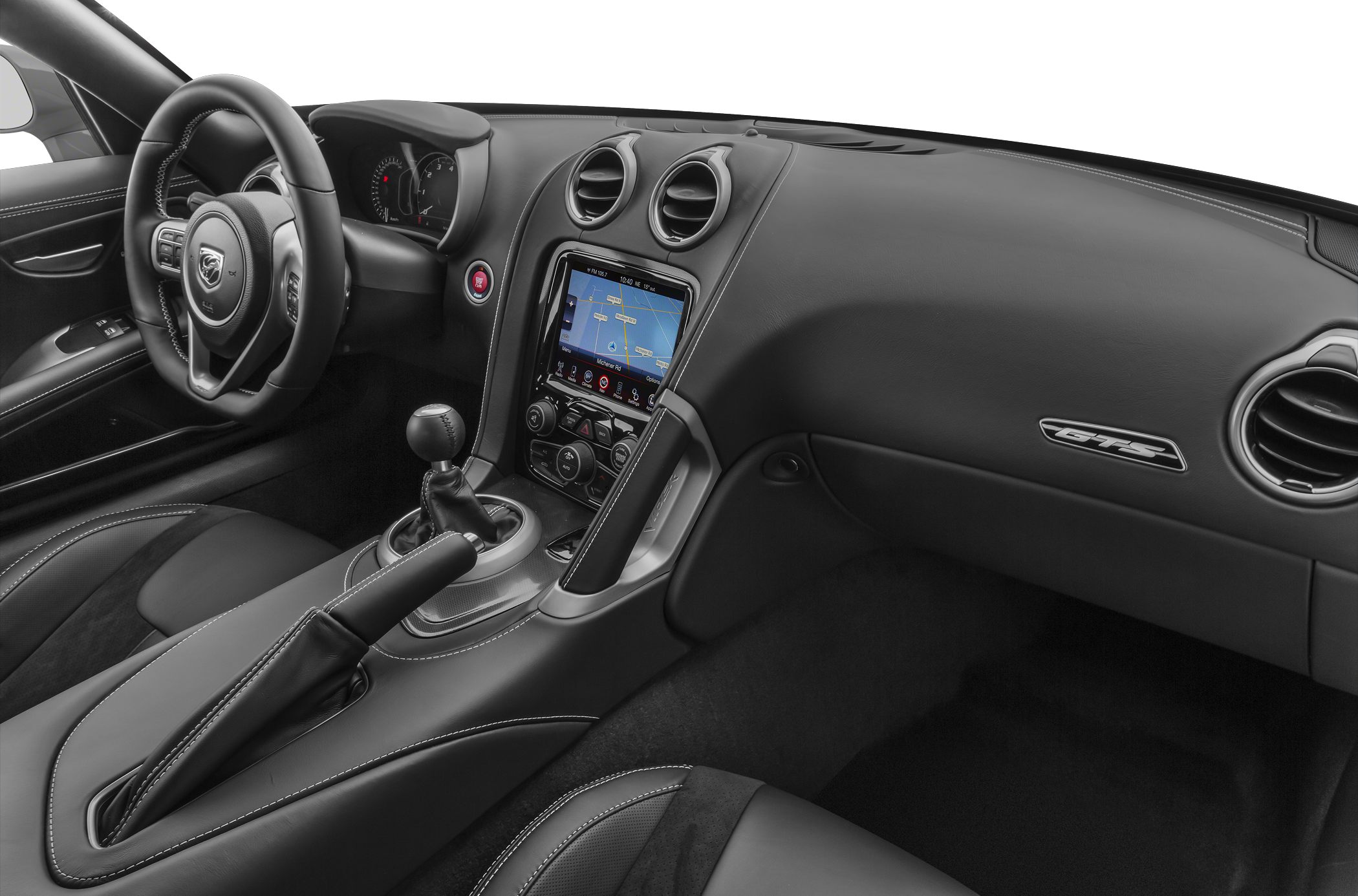 Manual transmission cockpit with touchscreen and round air vents
