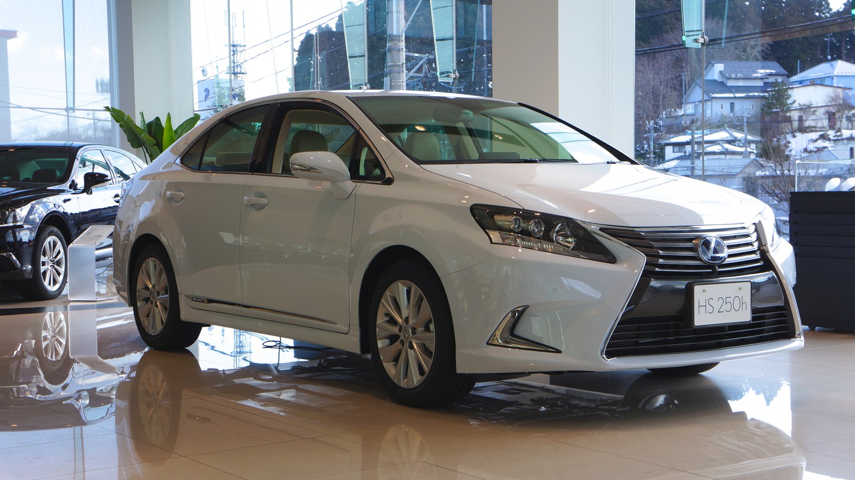 Front-side view with spindle grille and sleek headlights
