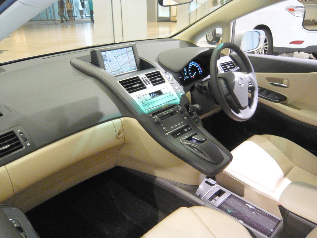 Modern car interior with navigation display and steering wheel