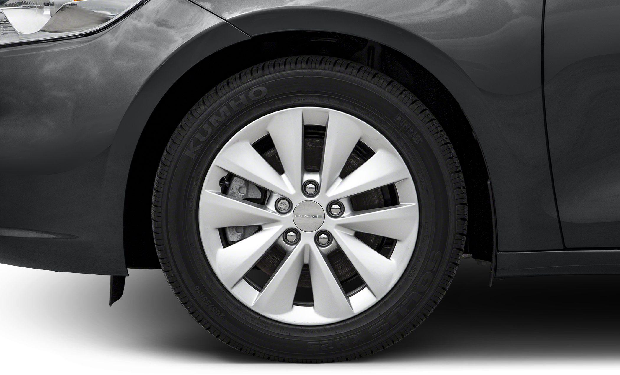 Close-up of alloy wheel and Kumho tire on car front side