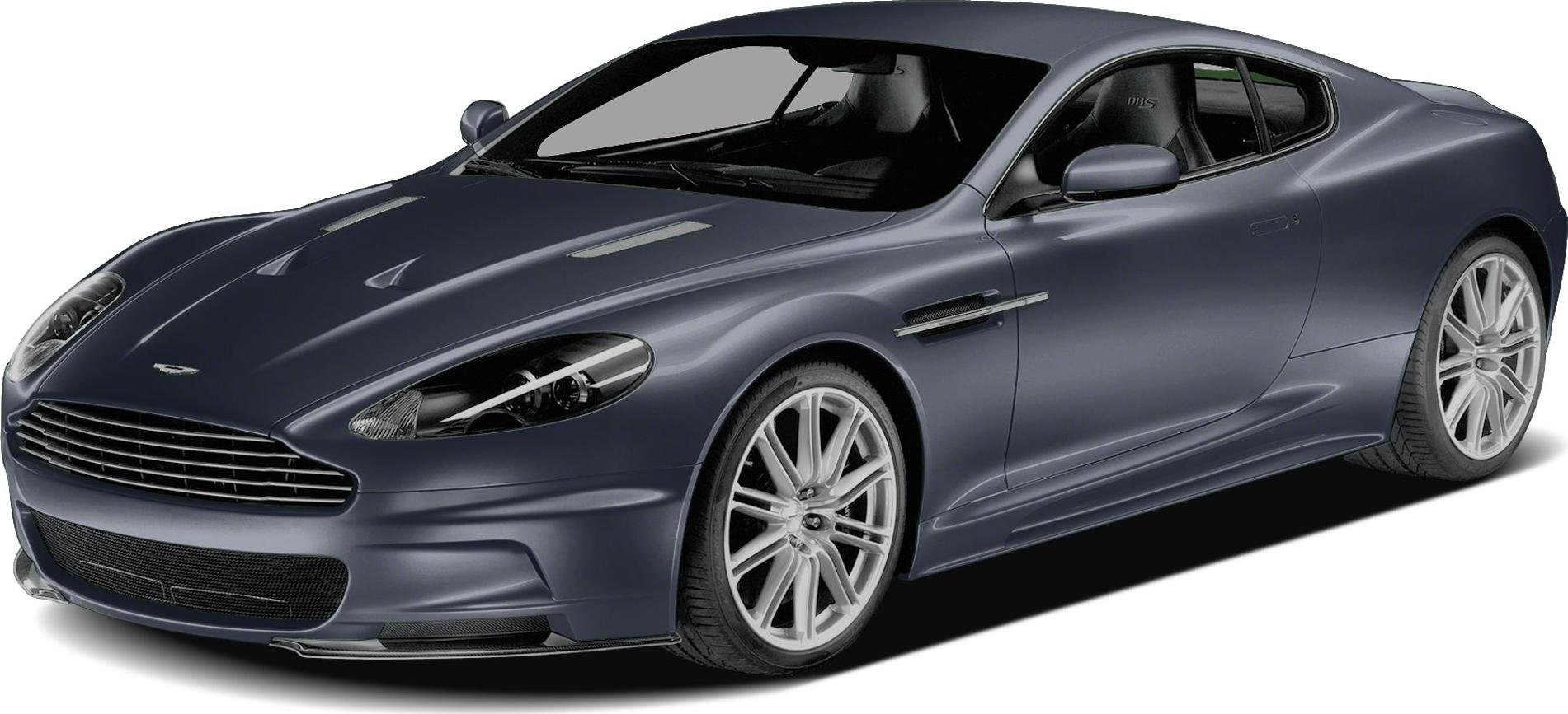 Aerodynamic hood vents and alloy wheels on luxury sports coupe