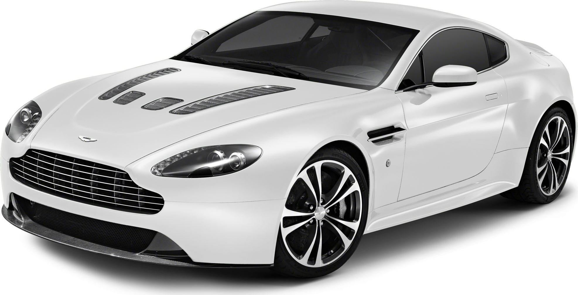 White coupe with hood vents, sleek grille, and multi-spoke alloy wheels