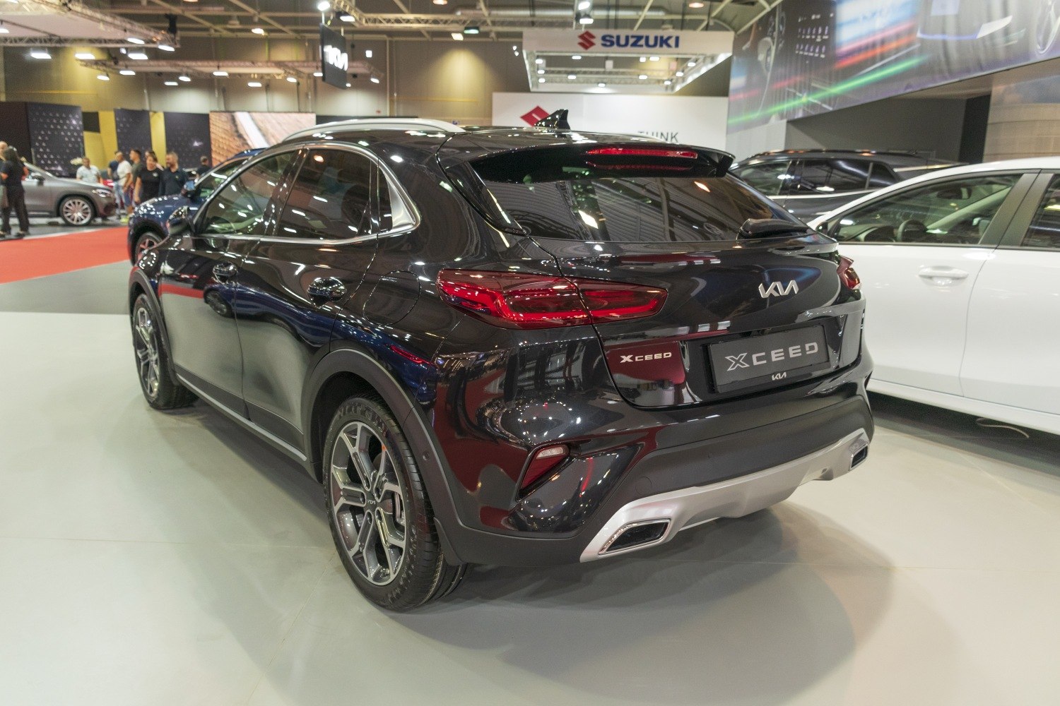 Rear view highlighting LED tail lights and dual exhaust design.