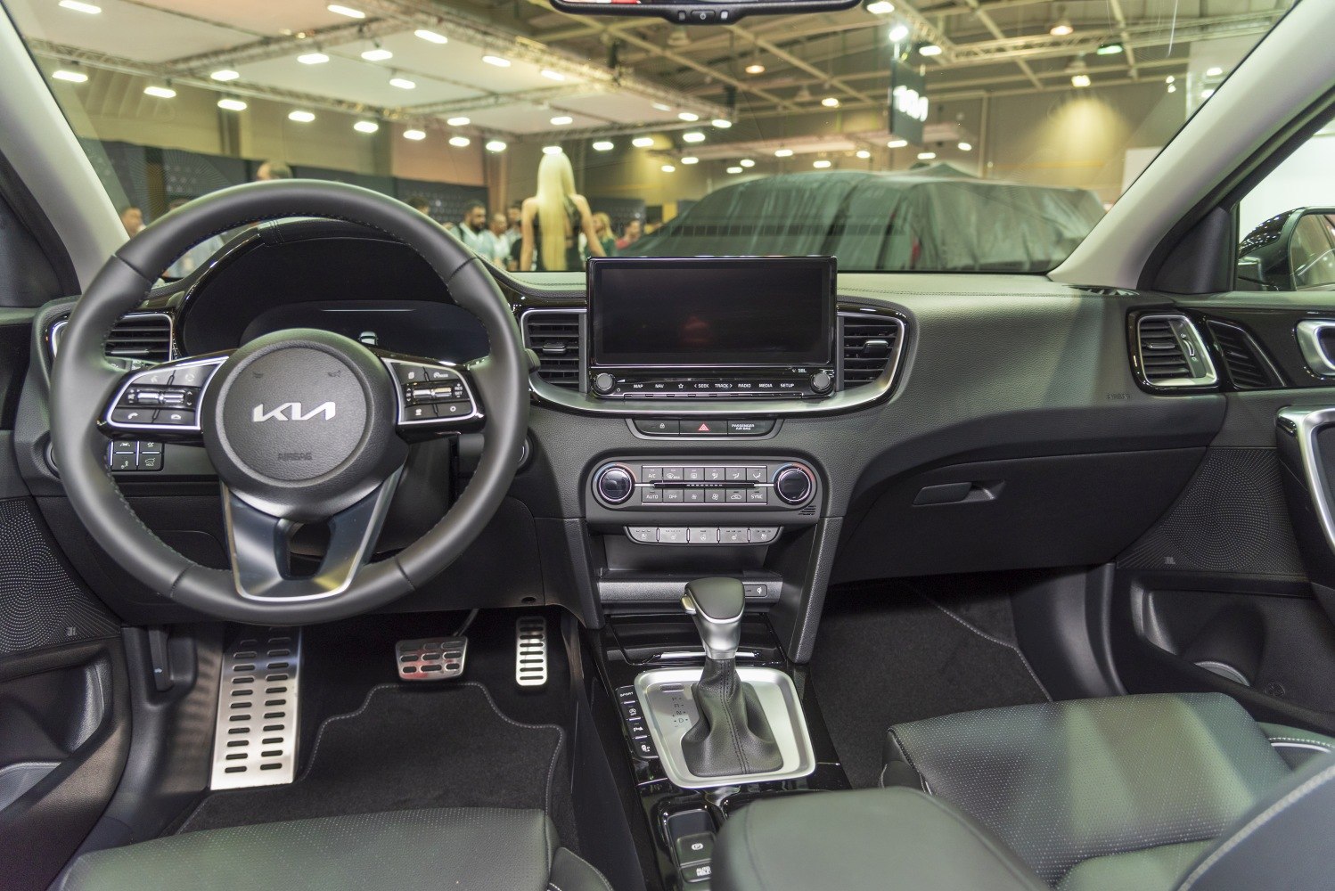 Interior dashboard with touchscreen and ergonomic steering wheel