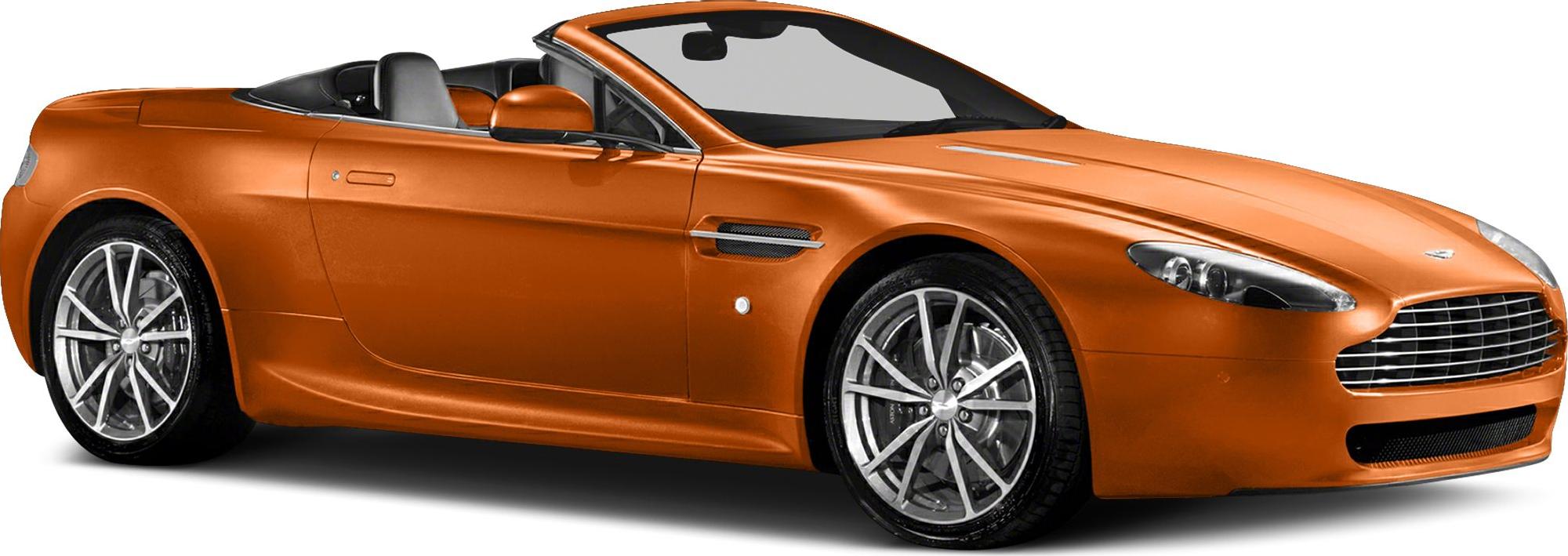 Orange convertible coupe with open roof and sporty alloy wheels